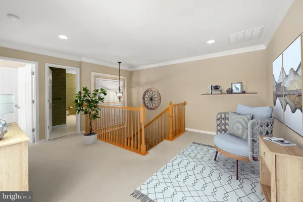 a bedroom with furniture and a rug