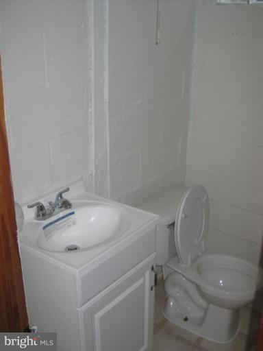 6703 Canongate Road Baltimore, MD 21239 - Photo 16 of 27 Half Bath 1