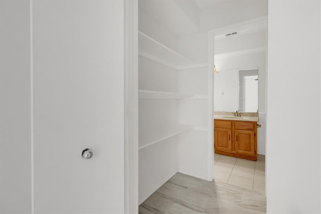 2018 Embassy Way Carrollton, TX 75006 - Photo 16 of 26 a room that has a window in it