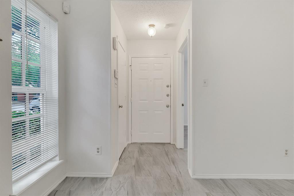 2018 Embassy Way Carrollton, TX 75006 - Photo 2 of 26 a view of an empty room with a window