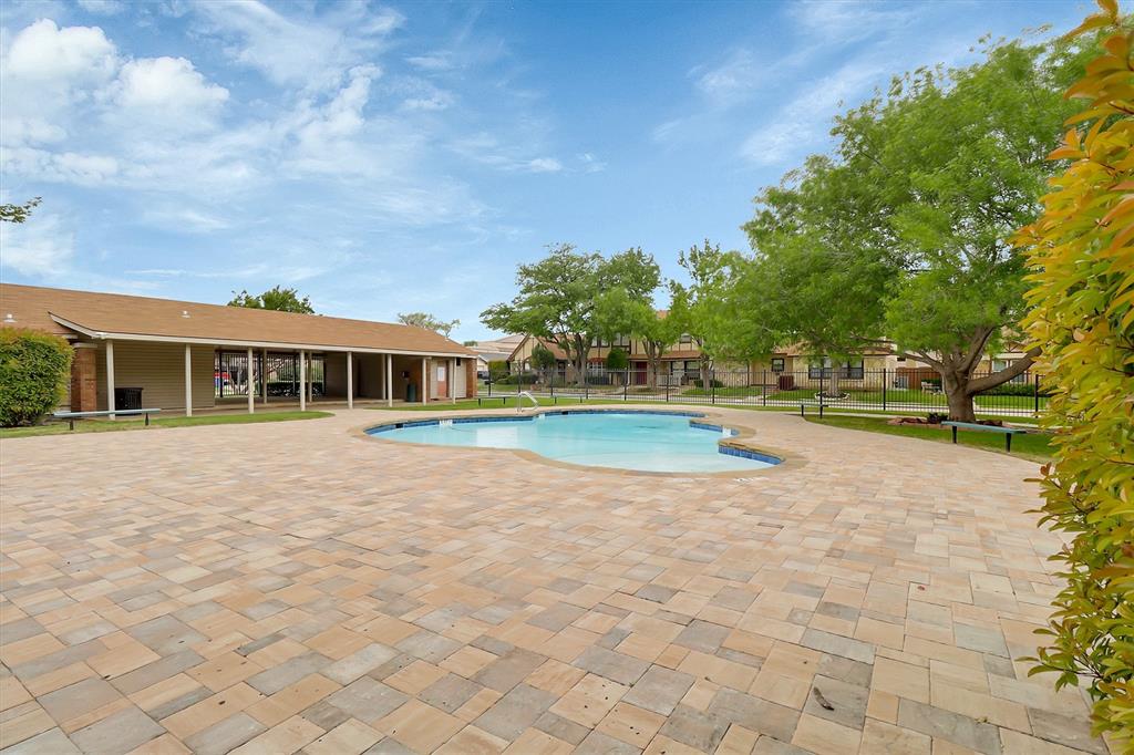2018 Embassy Way Carrollton, TX 75006 - Photo 23 of 26 a view of pool and yard