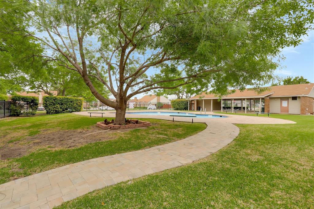 2018 Embassy Way Carrollton, TX 75006 - Photo 25 of 26 a view of a house with swimming pool and sitting area
