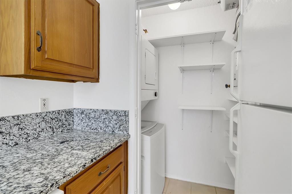 2018 Embassy Way Carrollton, TX 75006 - Photo 9 of 26 a kitchen with a sink and cabinets