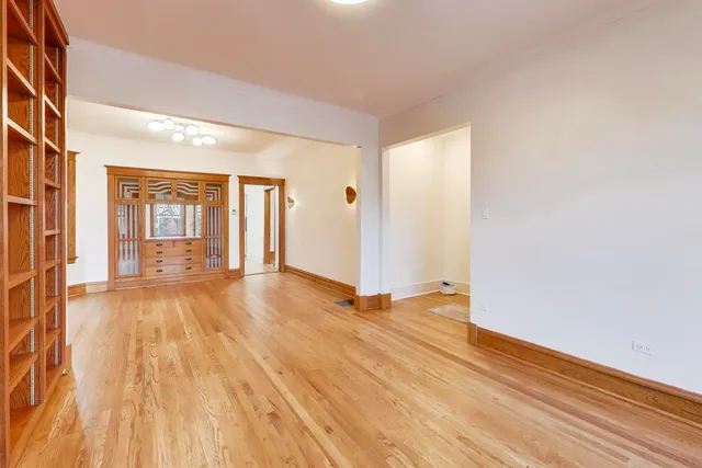 a view of an empty room and window