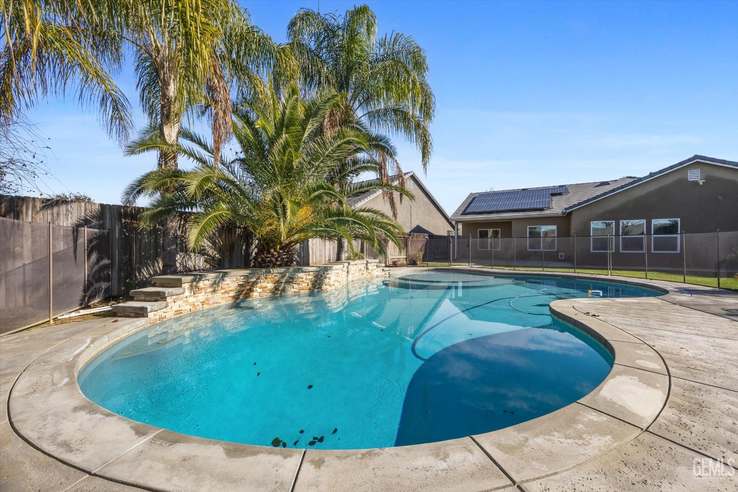 Undisclosed Address Bakersfield, CA 93314 - Photo 39 of 42 a view of a swimming pool with a patio