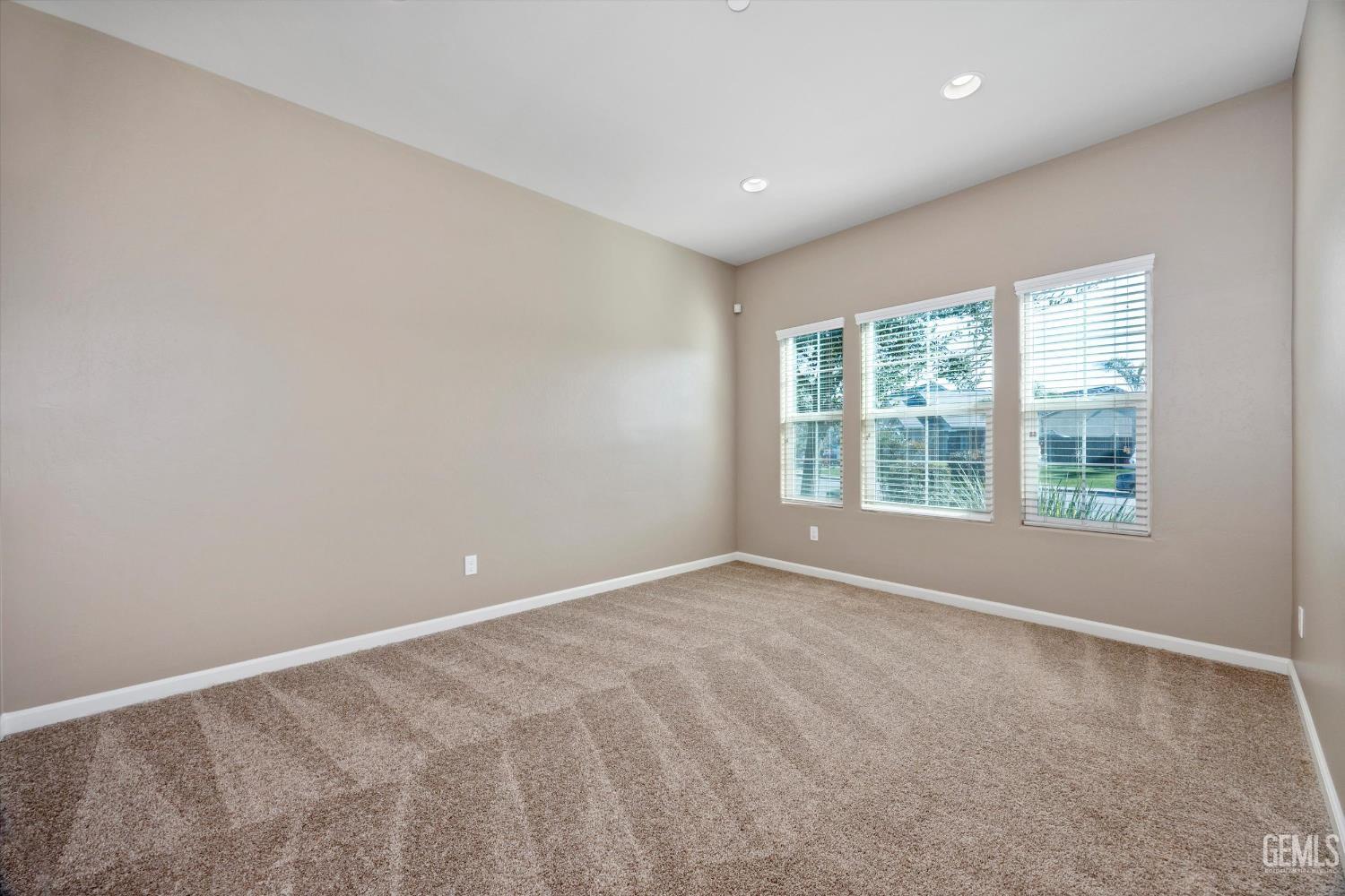 Undisclosed Address Bakersfield, CA 93314 - Photo 4 of 42 an empty room with windows