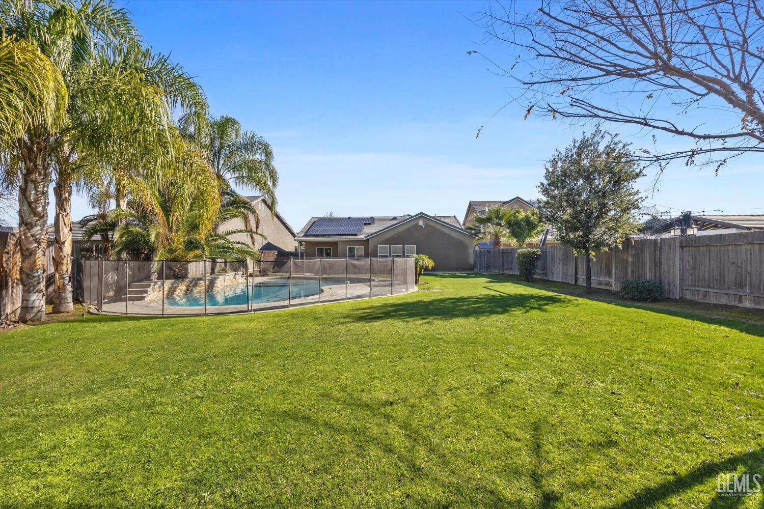 Undisclosed Address Bakersfield, CA 93314 - Photo 42 of 42 a view of a house with a yard