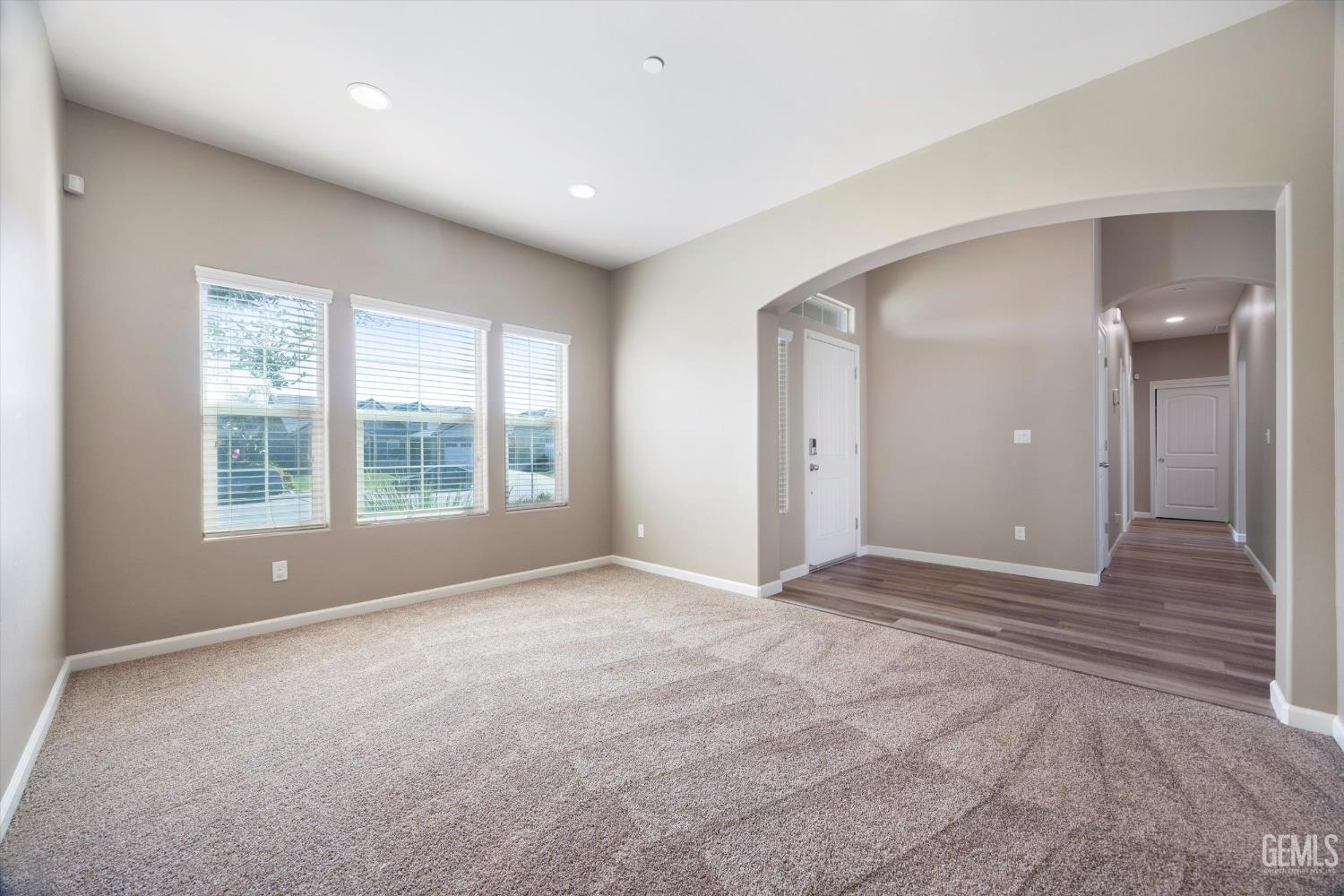 Undisclosed Address Bakersfield, CA 93314 - Photo 6 of 42 a view of an empty room with a window