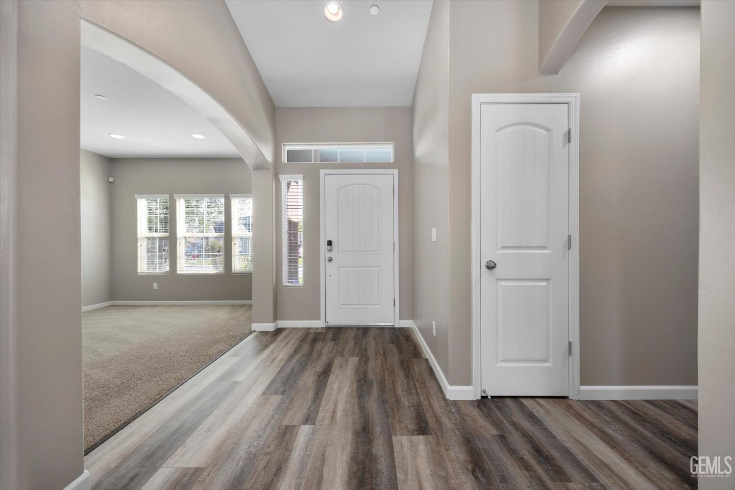 Undisclosed Address Bakersfield, CA 93314 - Photo 7 of 42 a view of a room with wooden floor and window