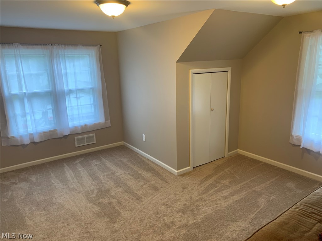 975 Lander Road Cleveland, OH 44143 - Photo 13 of 22 Upstairs bedroom with walk-in closet as well as 2 other storage spaces