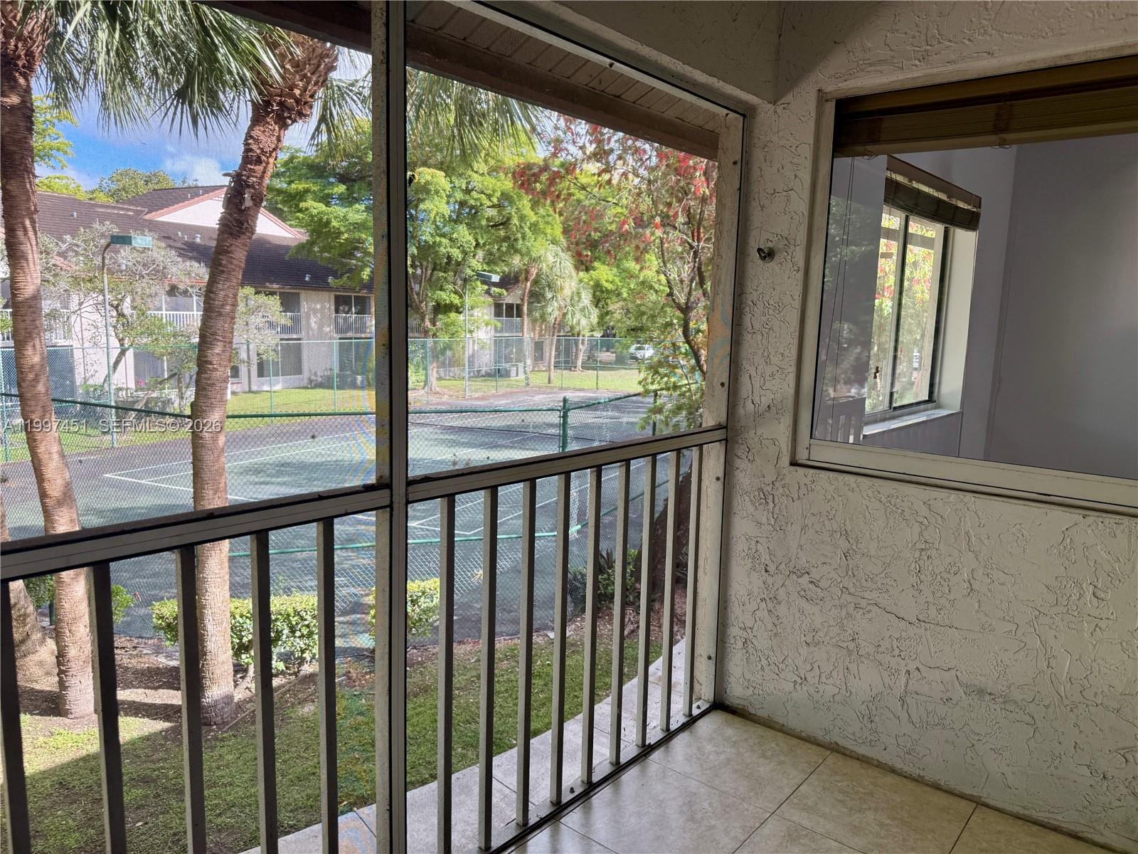 9435 Southwest 140th Court, Unit 9435 Miami, FL 33186 - Photo 24 of 33 a view of a porch
