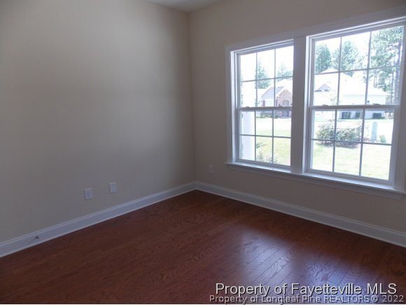 344 Kerr Lake Road Aberdeen, NC 28315 - Photo 15 of 25 an empty room with a window