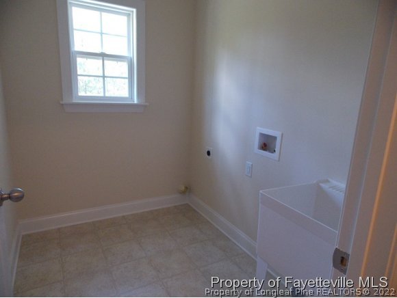 344 Kerr Lake Road Aberdeen, NC 28315 - Photo 18 of 25 a bathroom with a bathtub