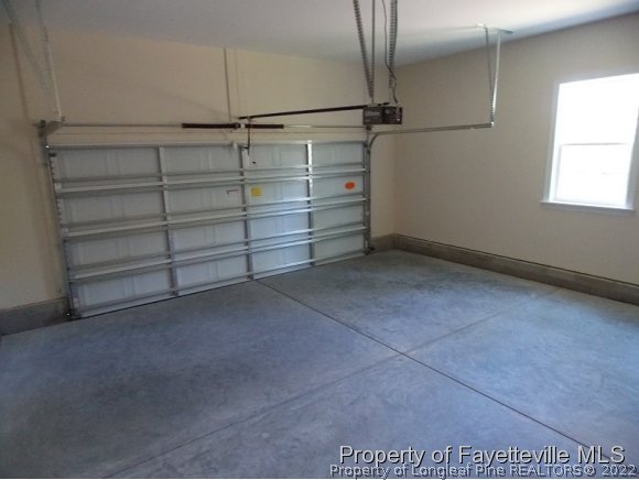 344 Kerr Lake Road Aberdeen, NC 28315 - Photo 19 of 25 a view of room and empty racks