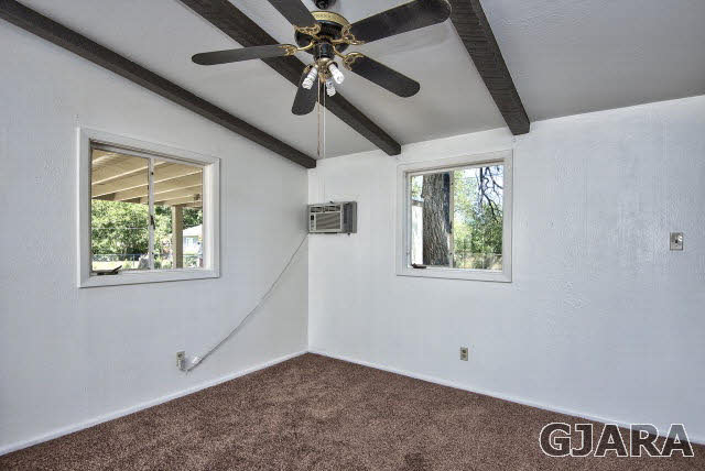 2836 B Road Grand Junction, CO 81503 - Photo 16 of 29 an empty room with windows and fan
