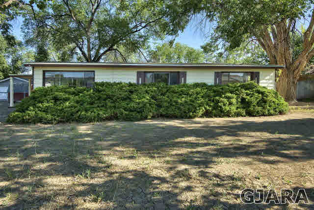 2836 B Road Grand Junction, CO 81503 - Photo 2 of 29 front view of a house with a yard