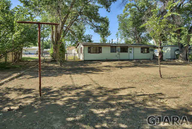 2836 B Road Grand Junction, CO 81503 - Photo 24 of 29 a front view of a house with a yard
