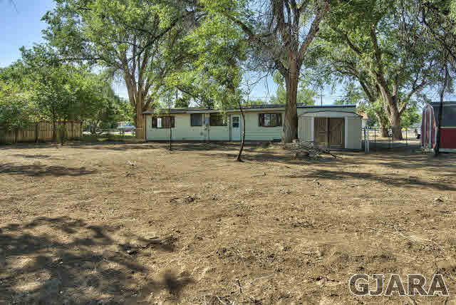 2836 B Road Grand Junction, CO 81503 - Photo 26 of 29 a backyard of a house with seating space