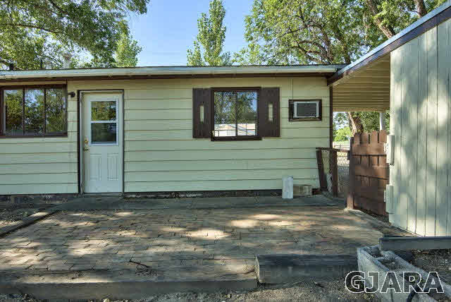 2836 B Road Grand Junction, CO 81503 - Photo 29 of 29 a view of a house with a yard