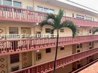 a view of a balcony with small plants
