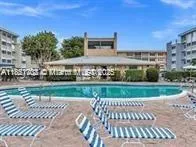 a view of yard with seating area and green space