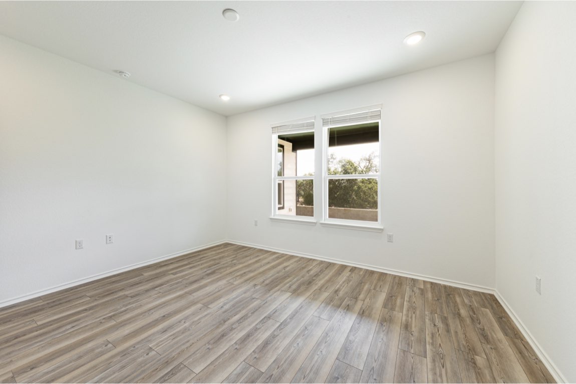201 Coachsmith Street Georgetown, TX 78633 - Photo 20 of 32 wooden floor in a room