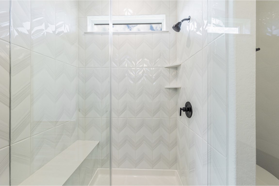 201 Coachsmith Street Georgetown, TX 78633 - Photo 24 of 32 a bathroom with a shower