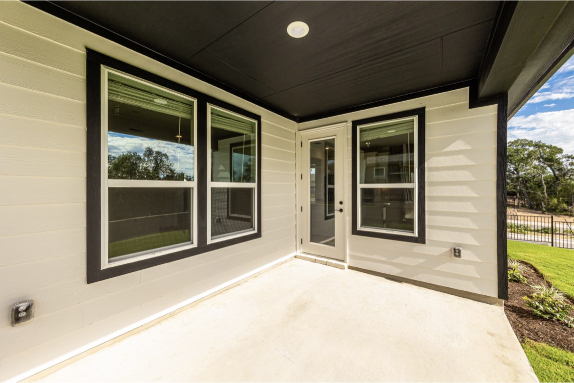 201 Coachsmith Street Georgetown, TX 78633 - Photo 27 of 32 a view of a entrance door of the house