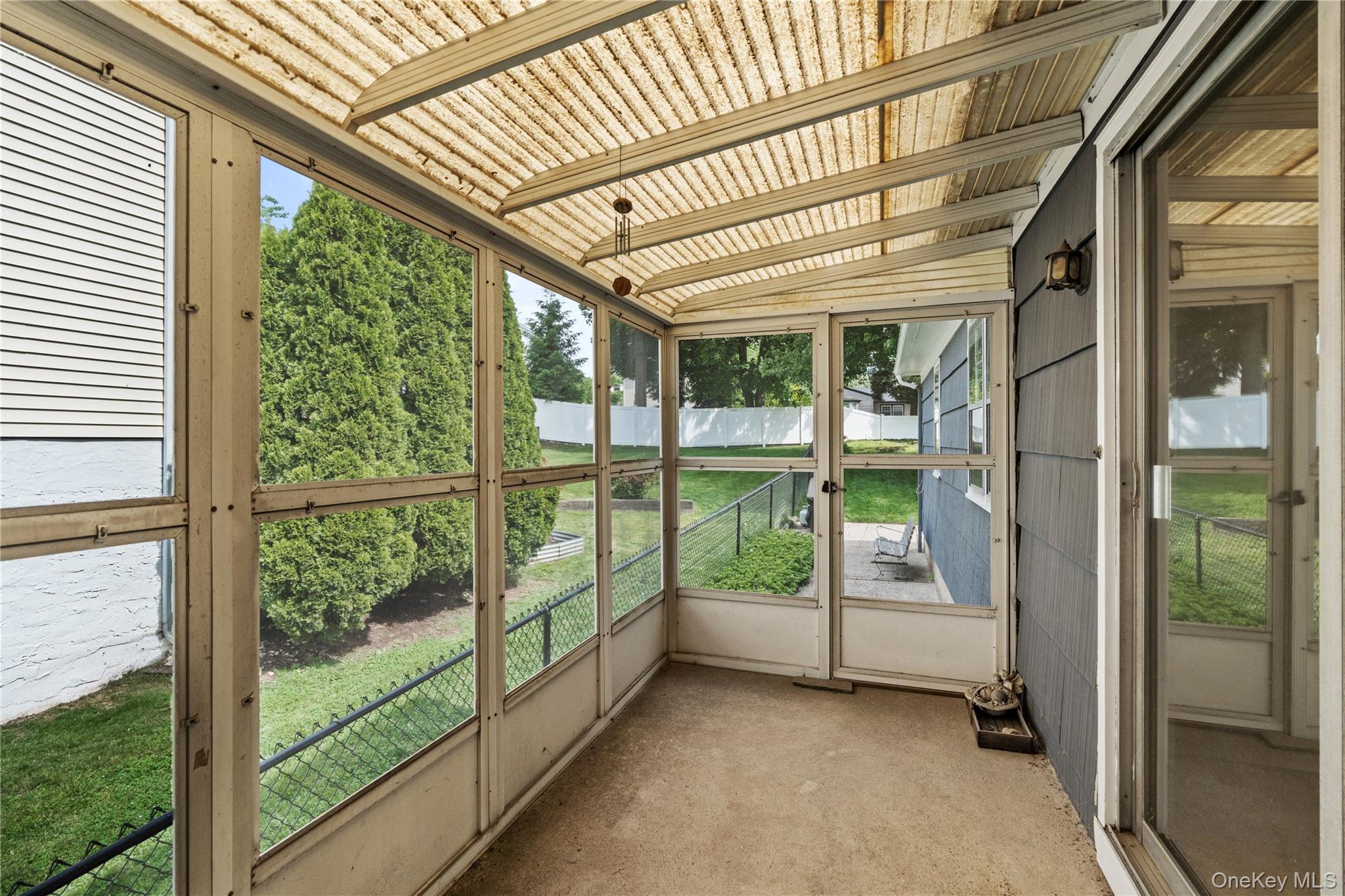 11 Dearborn Street New Rochelle, NY 10801 - Photo 11 of 30 Enter from Kitchen or Dining Room - Porch