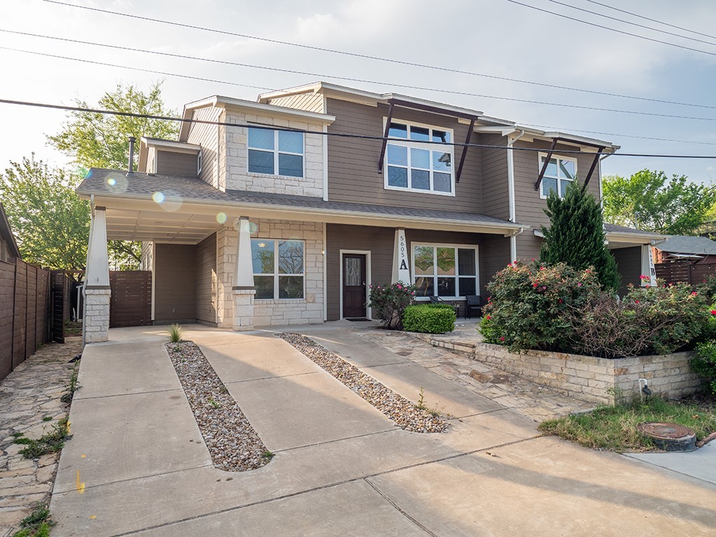 a front view of a house with yard