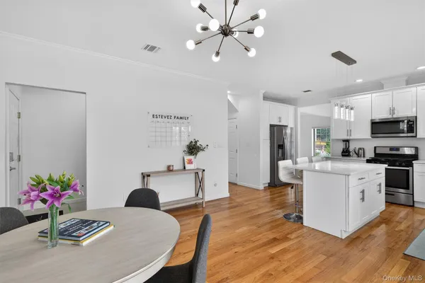a room with furniture and wooden floor