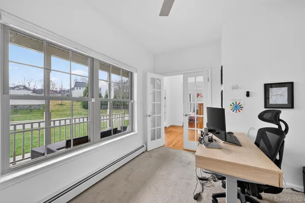 a room with furniture and gym equipment