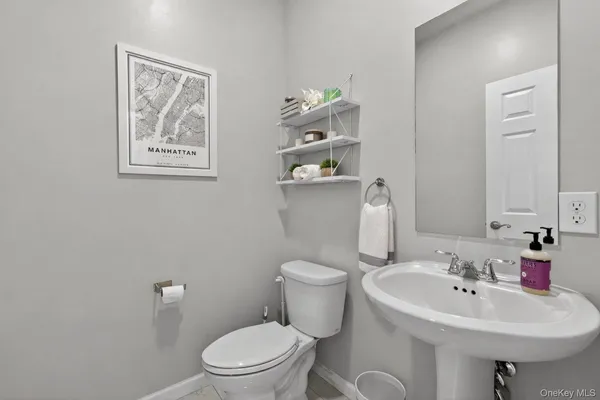 a view of staircase with wooden floor and a potted plant