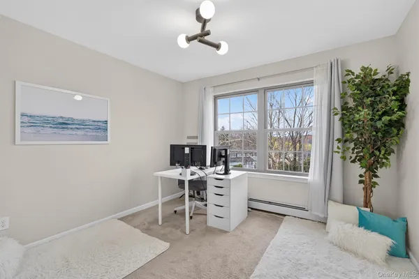 a view of a room with a wardrobe space