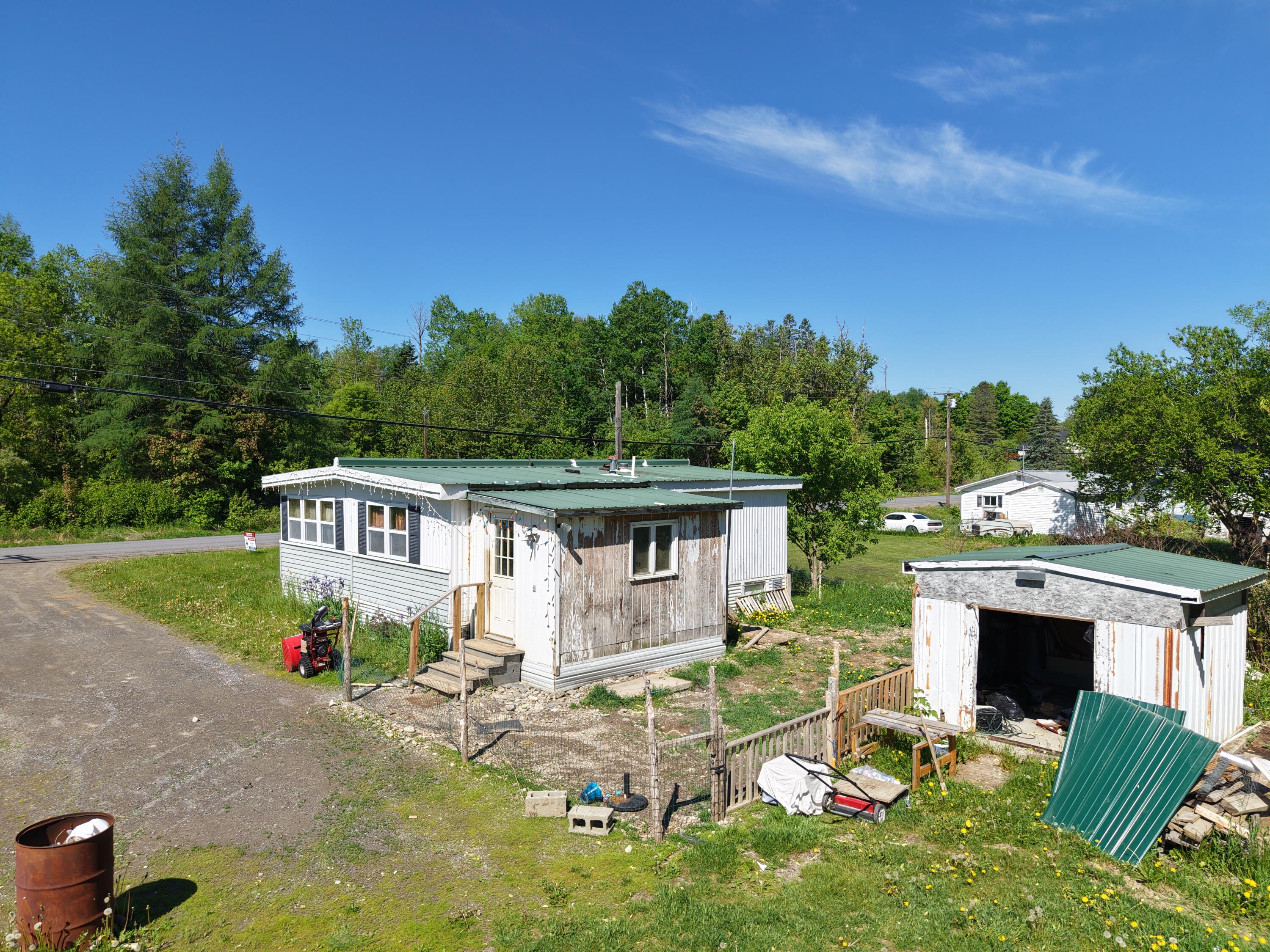 112 Robinson Road Blaine, ME 04734 - Photo 19 of 23 dji_fly_20250907_214158_0427_17811152741