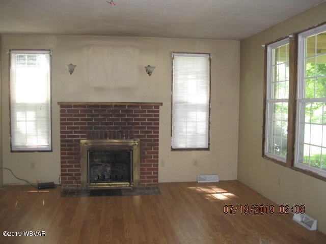 226 Island Road Lock Haven, PA 17745 - Photo 4 of 7 LIVING ROOM WITH NEW FLOORING