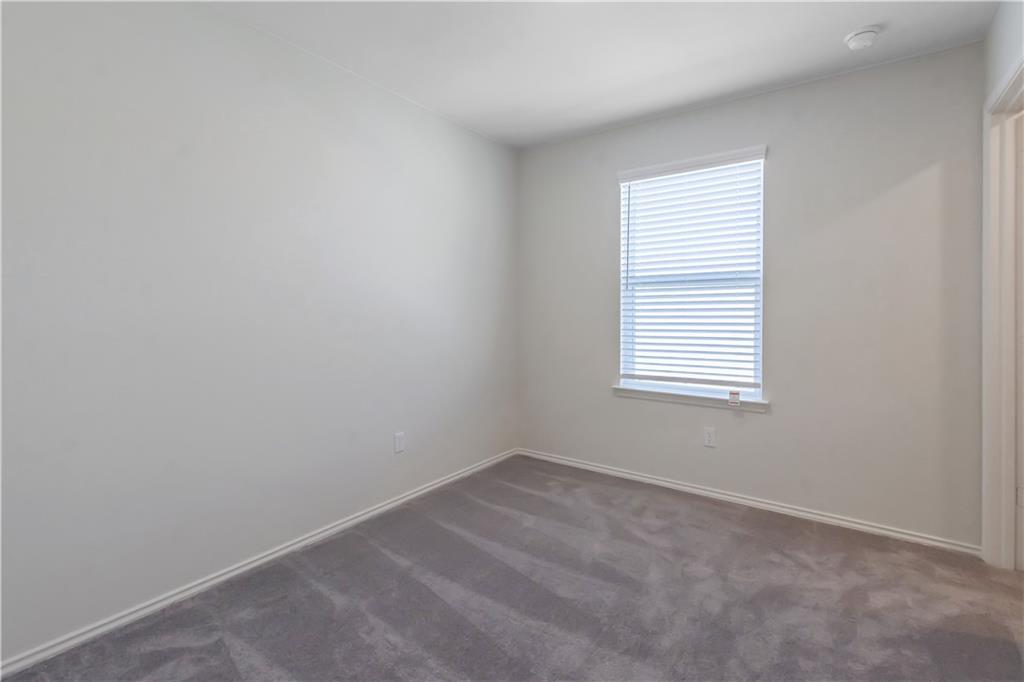 338 Pepperbark Loop Buda, TX 78610 - Photo 21 of 23 an empty room with a window
