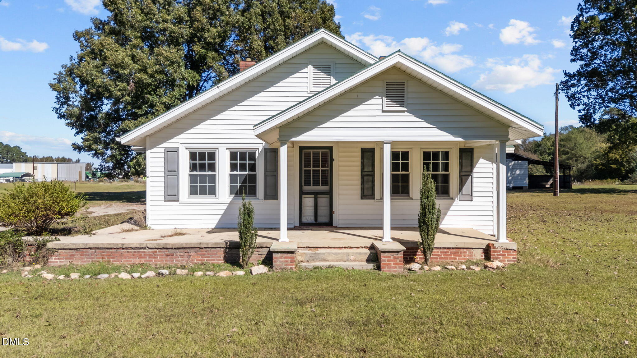 7477 Highway 58 Castalia, NC 27816 - Photo 2 of 43 a house view with a garden space