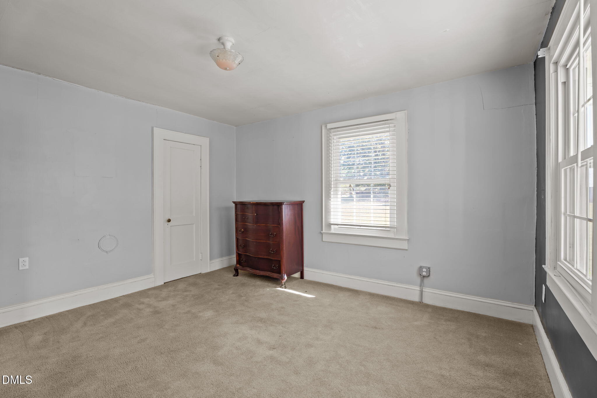 7477 Highway 58 Castalia, NC 27816 - Photo 25 of 43 an empty room with windows