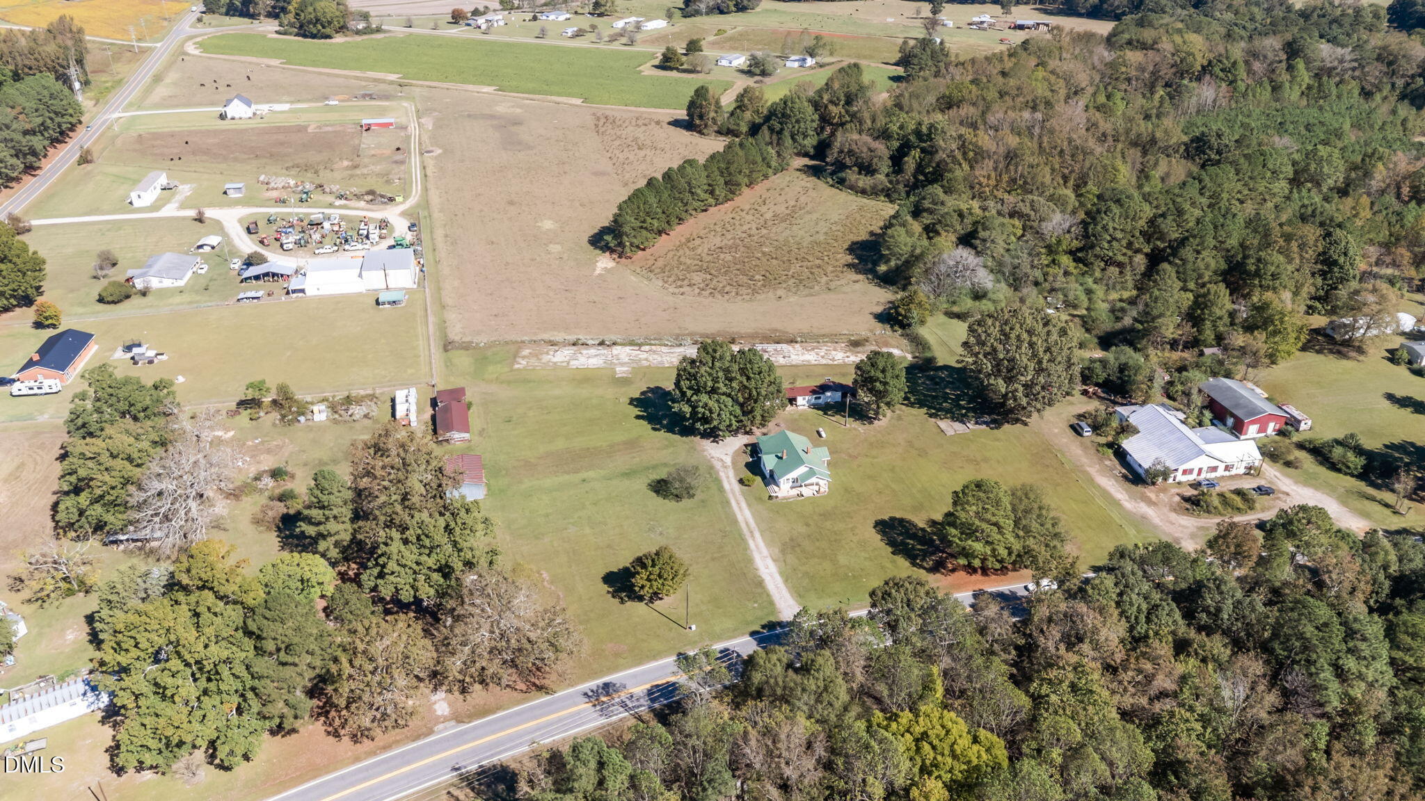 7477 Highway 58 Castalia, NC 27816 - Photo 35 of 43 an aerial view of a house with a yard and lake view
