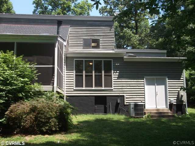 1100 Castle Hollow Road Midlothian, VA 23114 - Photo 7 of 8 a front view of a house with a yard
