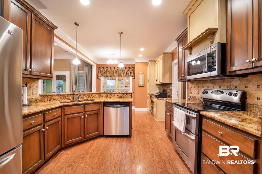24958 Bosbyshell Avenue Daphne, AL 36526 - Photo 8 of 32 Kitchen w Granite