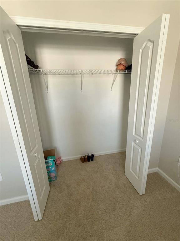 311 Redbud Road Palm Coast, FL 32137 - Photo 14 of 27 a view of an empty room