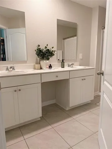 a view of a kitchen with a sink