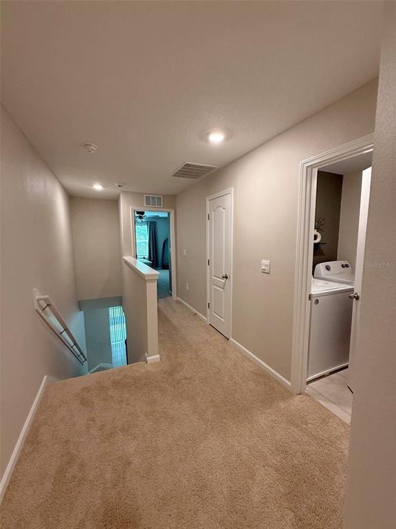 311 Redbud Road Palm Coast, FL 32137 - Photo 19 of 27 a view of a kitchen with a sink
