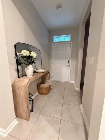 a kitchen with a sink and refrigerator