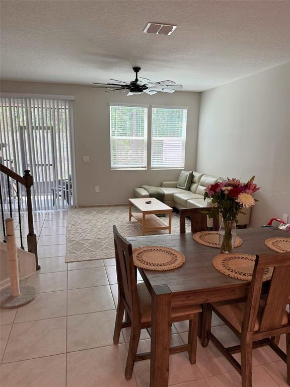 311 Redbud Road Palm Coast, FL 32137 - Photo 8 of 27 a dining room with furniture and window