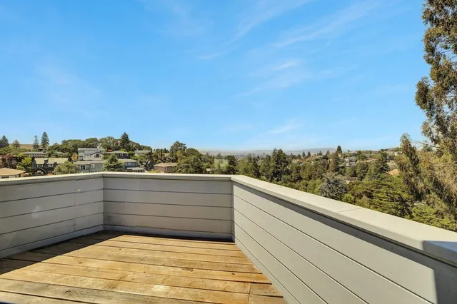 front view of a house with a small yard