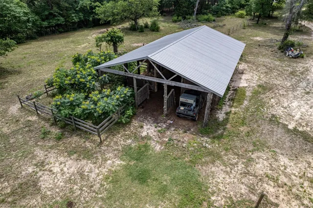 a house with trees in the background