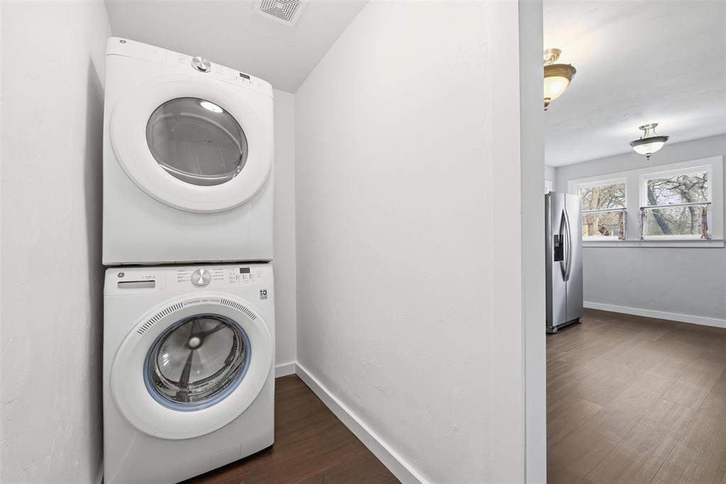 702 North Church Street Decatur, TX 76234 - Photo 23 of 36 a view of washer and dryer in a bathroom